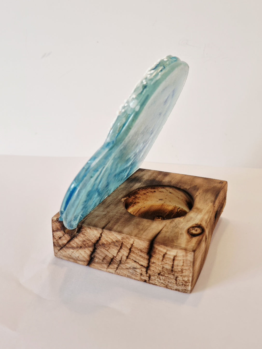 Fused glass heart wave with wooden tealight holder.
