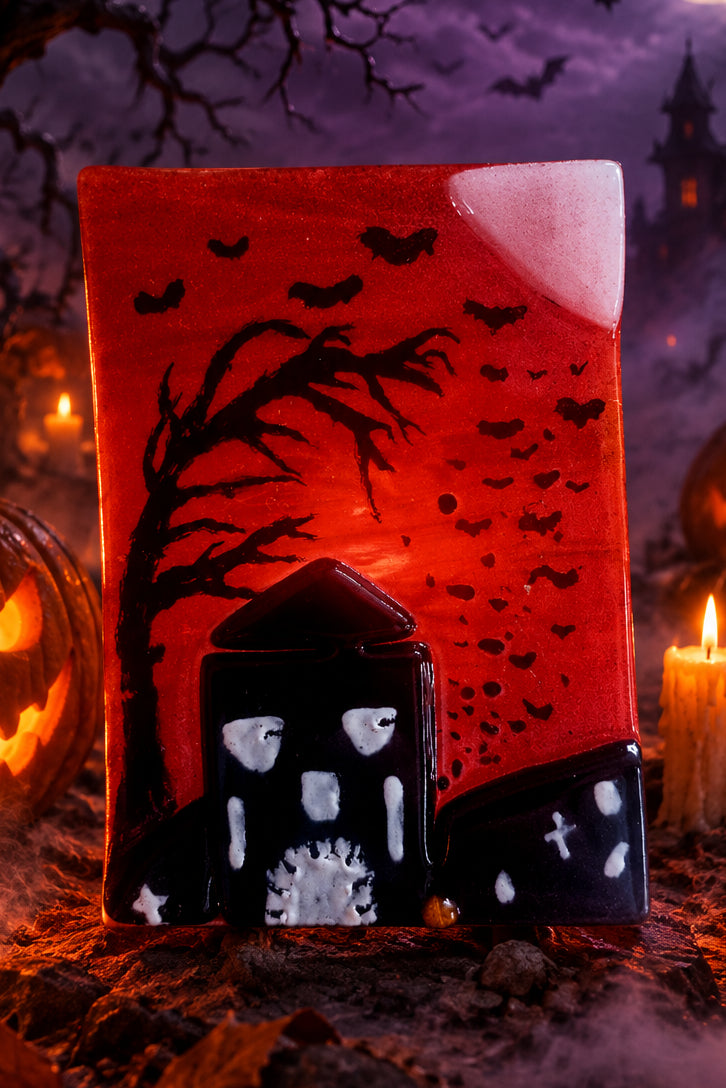Spooky fused glass tealight holders.