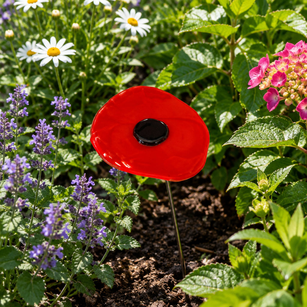 Fused glass poppy bee feeder.