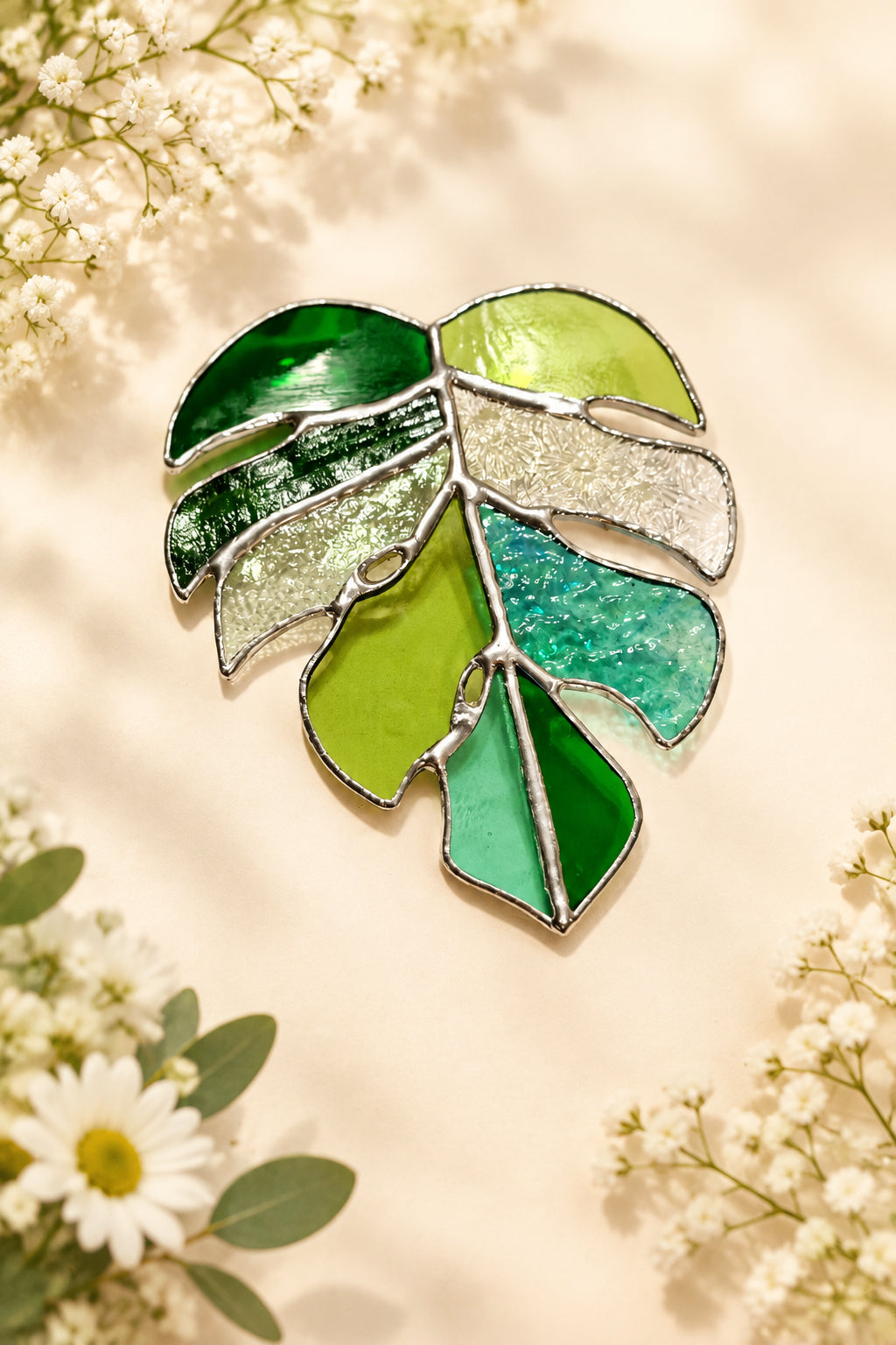 Stained glass monstera leaf.