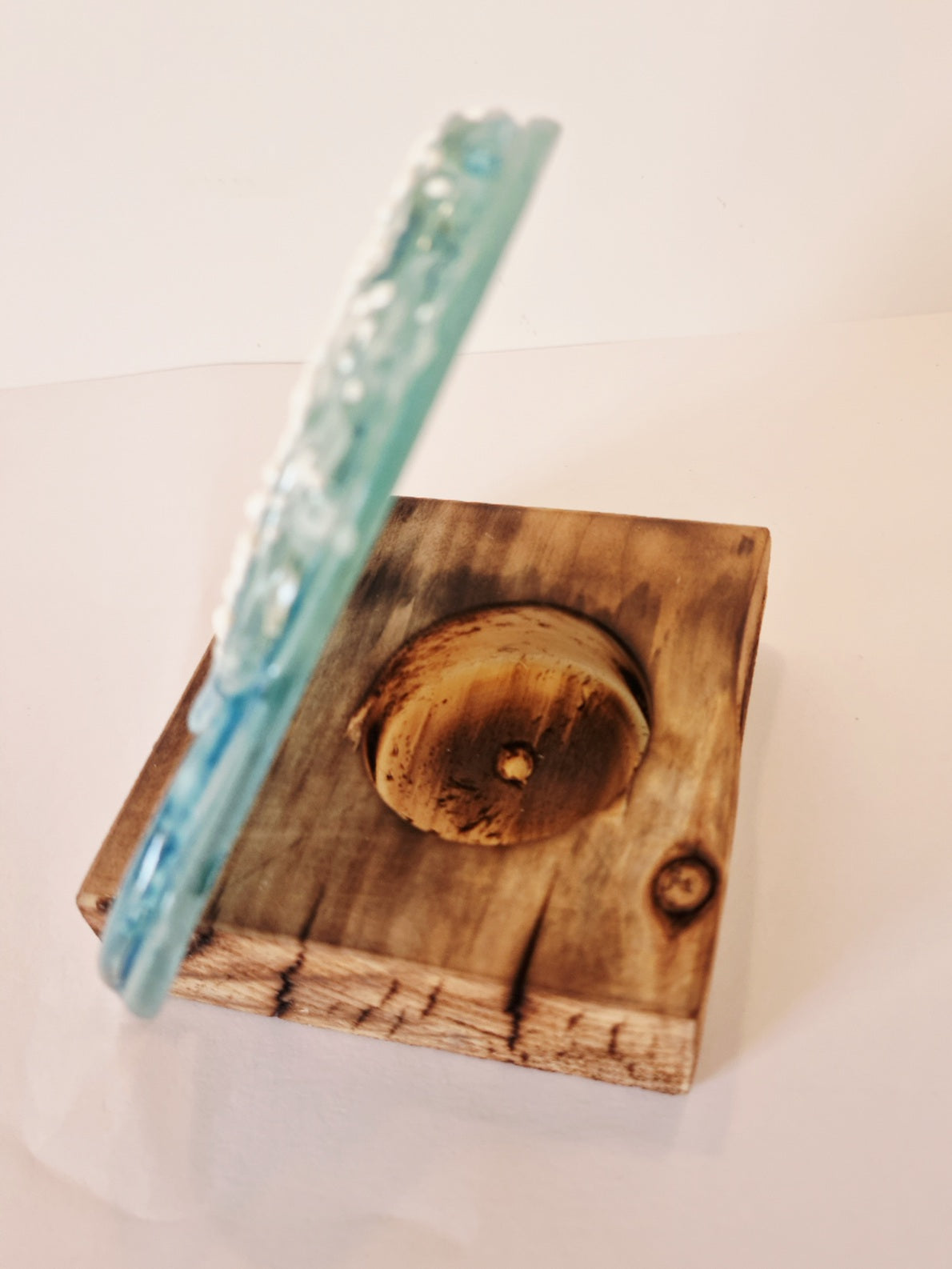 Fused glass heart wave with wooden tealight holder.