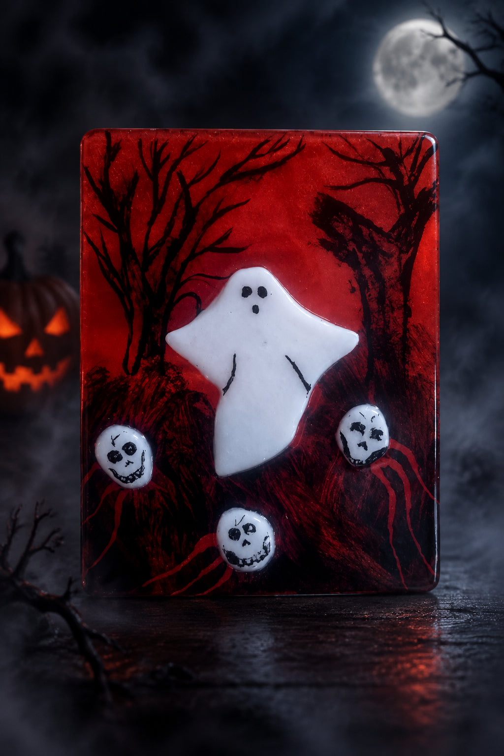Spooky fused glass tealight holders.