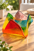 Fused glass rainbow tealight holder.