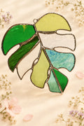 Stained glass monstera leaf.