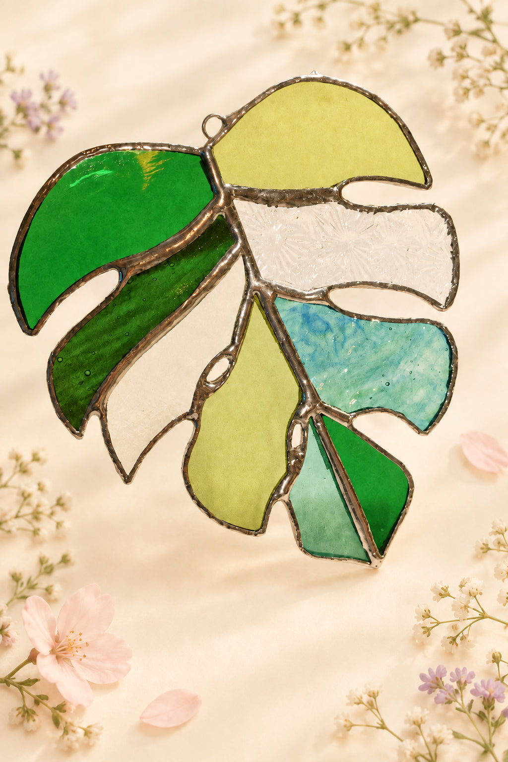 Stained glass monstera leaf.